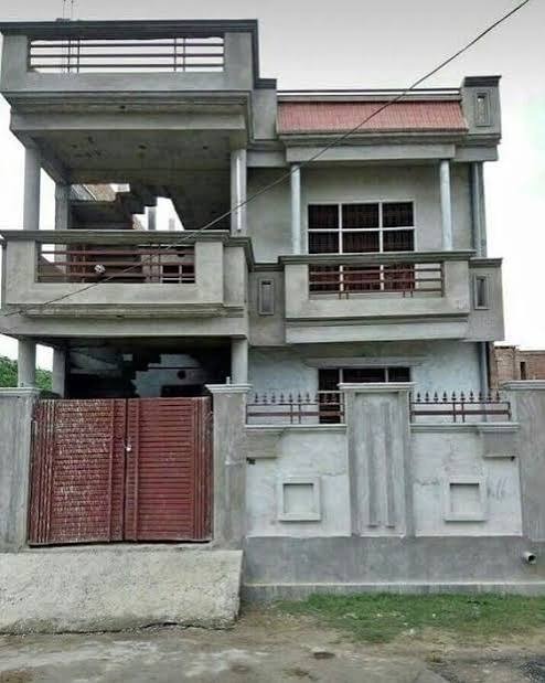Completed small house with gated compound