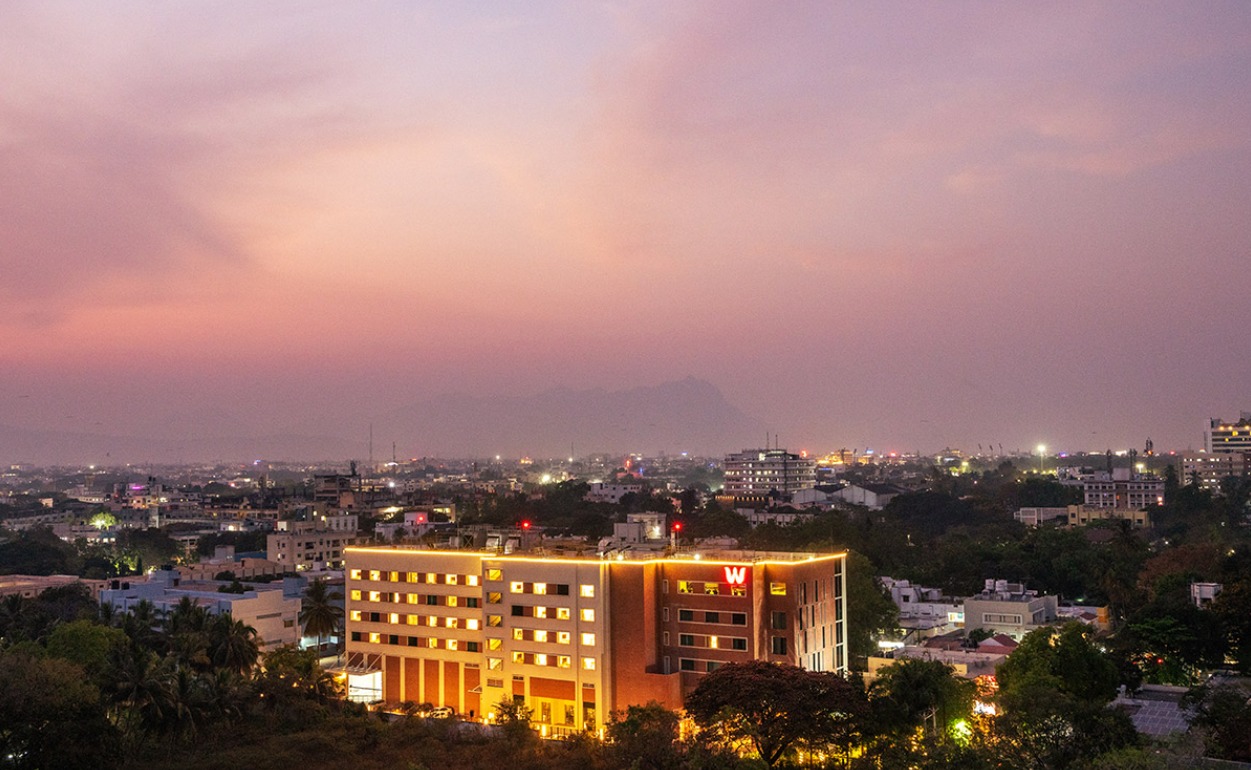 Aerial view of ITC WelcomHotel at dusk