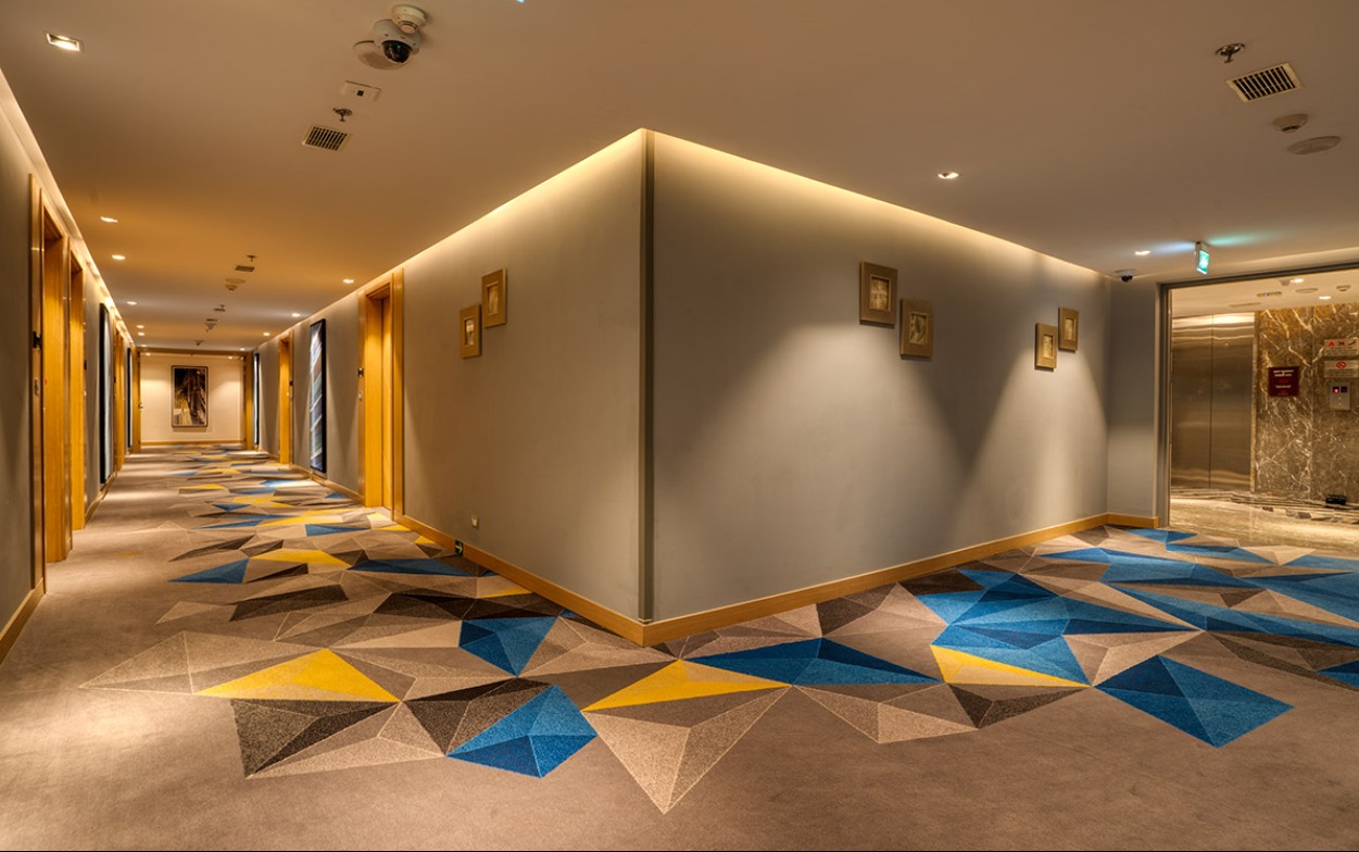 Guest room corridor at ITC WelcomHotel