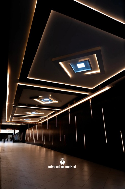Lit walkway at Minnal M Mahal